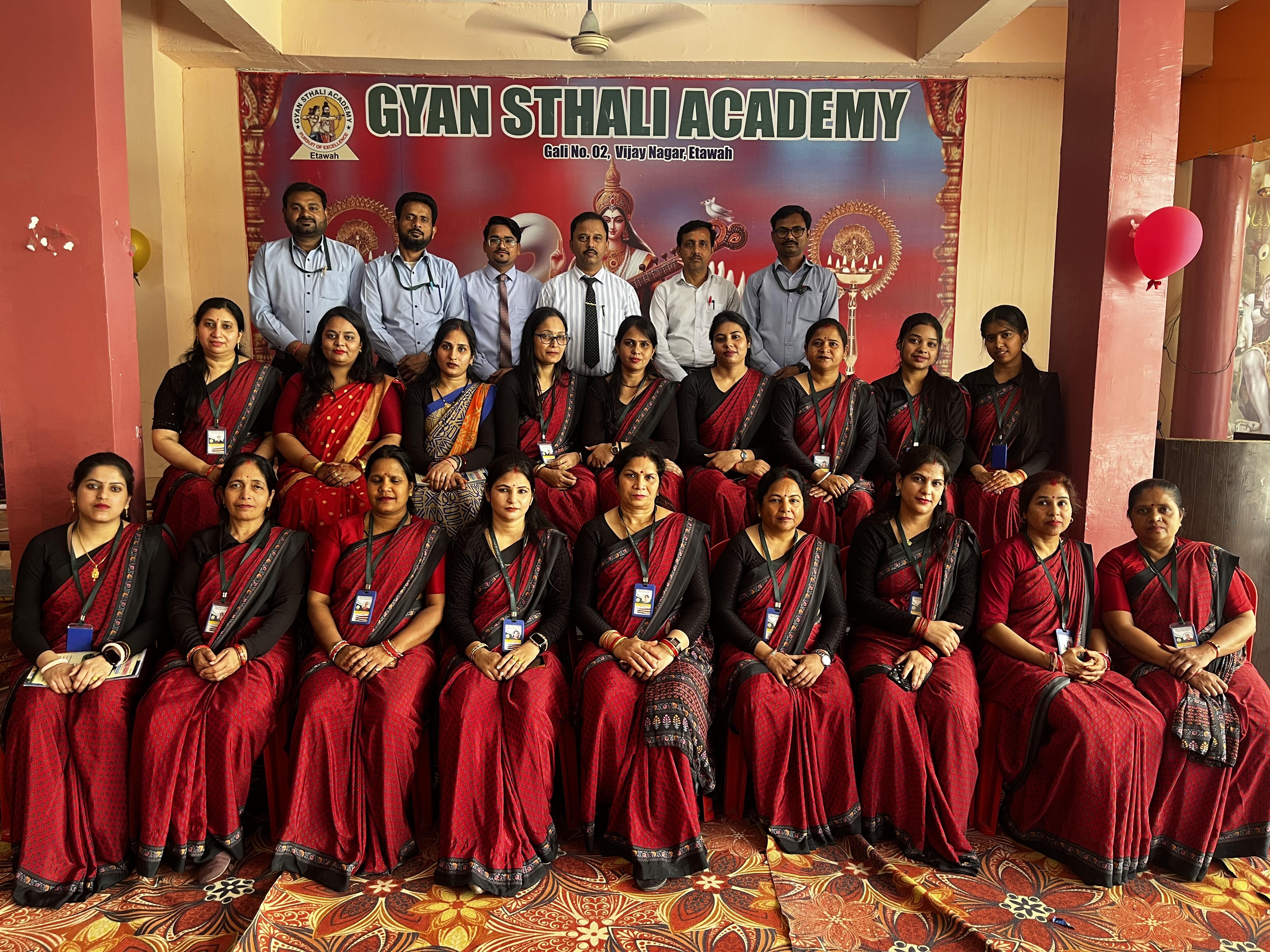 Staff seated for a school conference